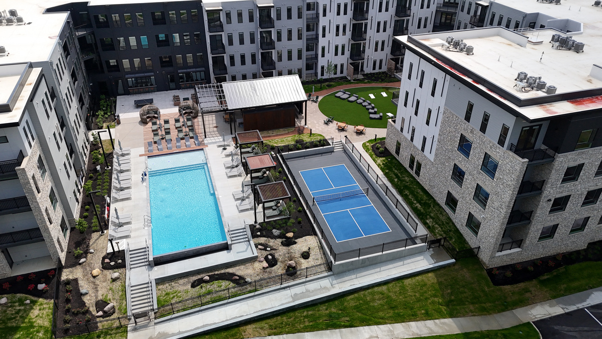 Resort-style pool and tennis court at the SYLO residences
